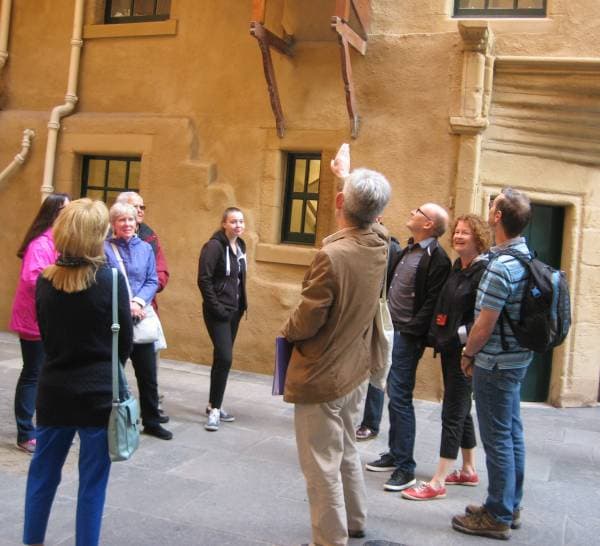 Group of visitors with guide